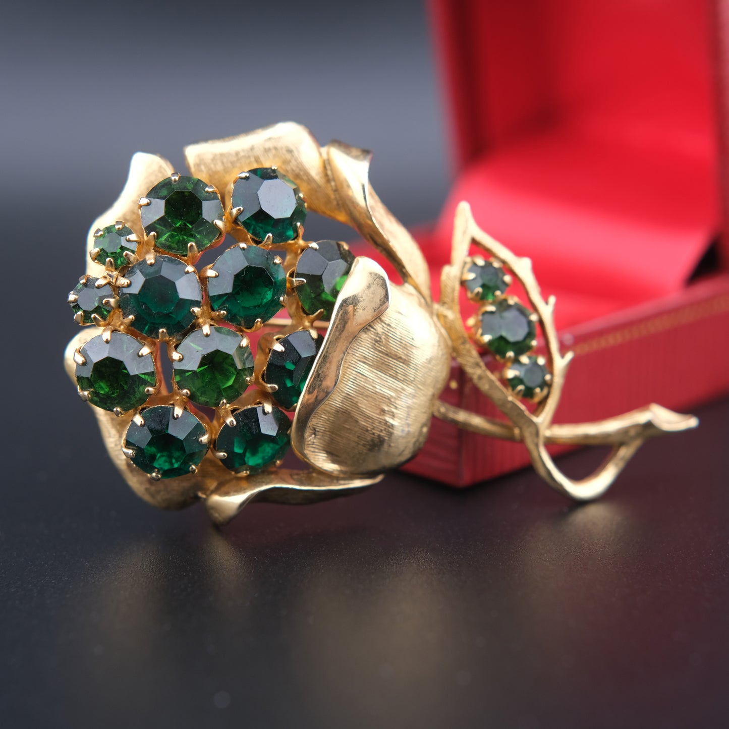 Vintage Gold-Tone Flower Brooch with Emerald Green Rhinestones