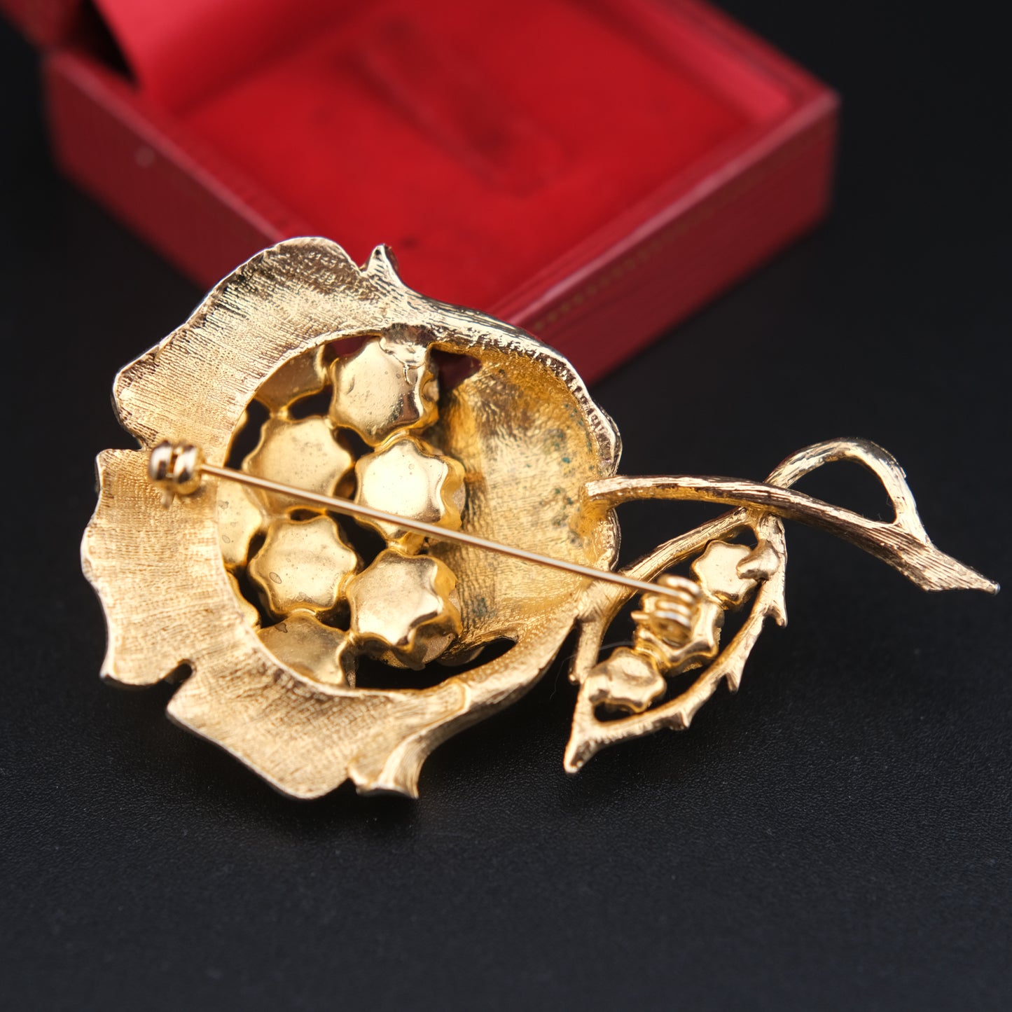 Vintage Gold-Tone Flower Brooch with Emerald Green Rhinestones