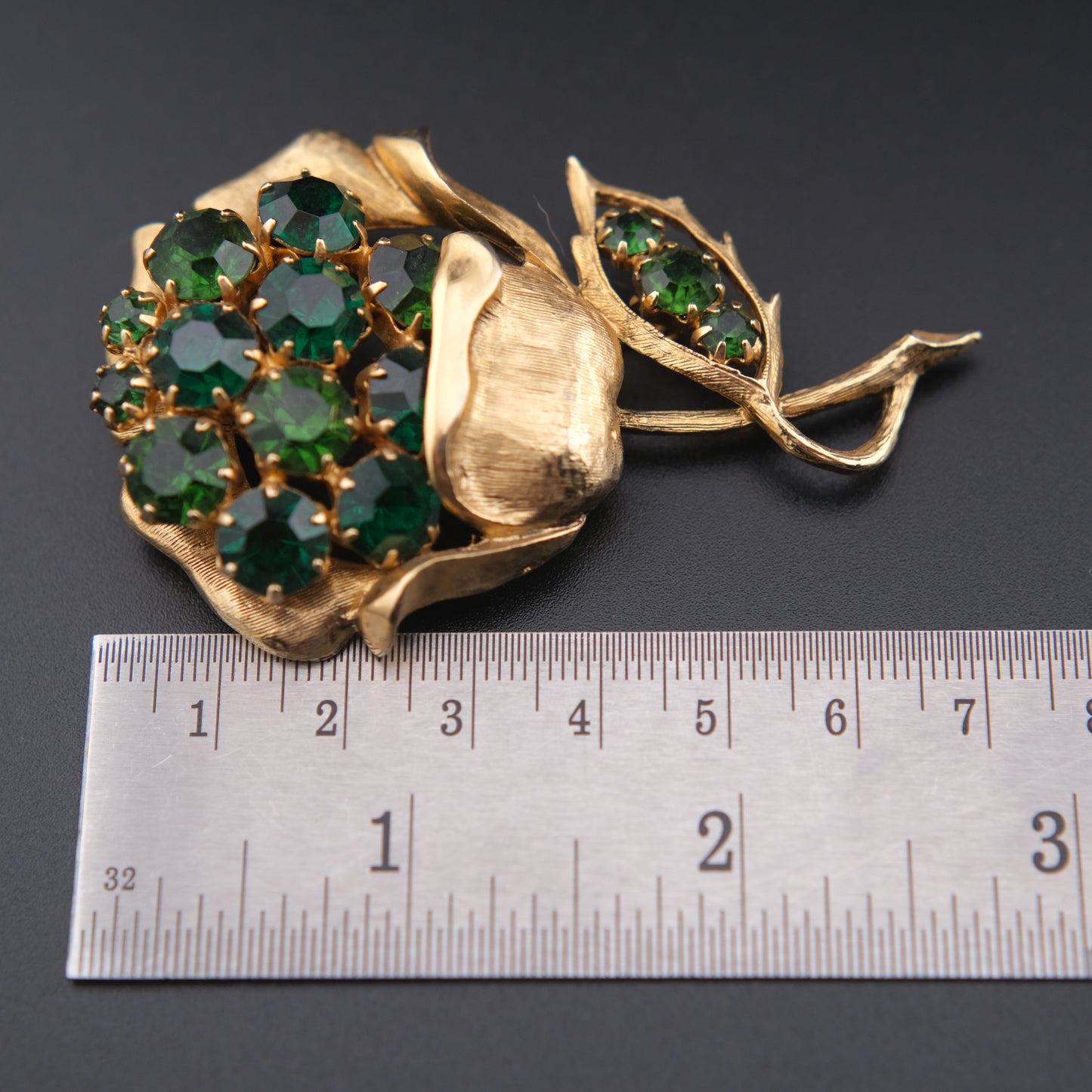 Vintage Gold-Tone Flower Brooch with Emerald Green Rhinestones