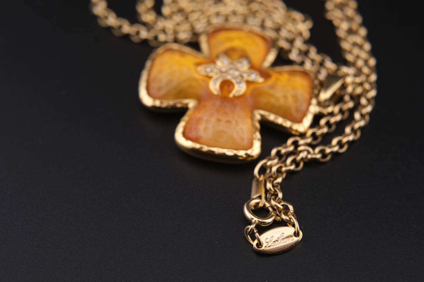 Vintage Leilian Textured Resin Cross Pendant Necklace with Fleur-de-Lis Rhinestone Detail