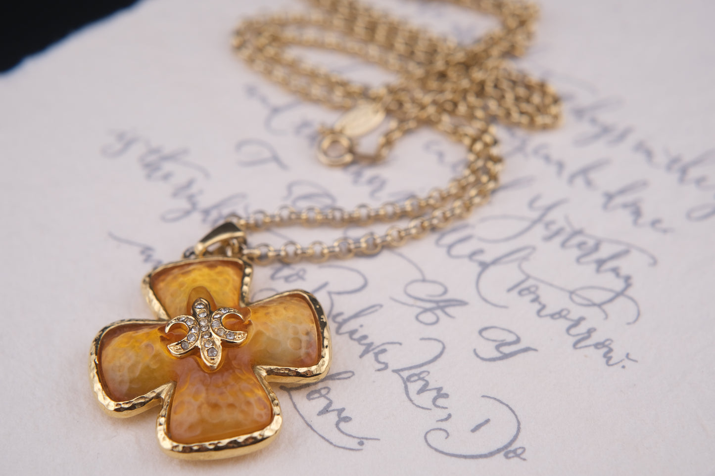 Vintage Leilian Textured Resin Cross Pendant Necklace with Fleur-de-Lis Rhinestone Detail
