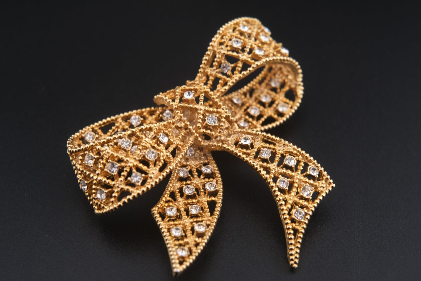 Vintage Kenneth Jay Lane Filigree Bow Brooch – Gold-Tone with Crystal Rhinestones