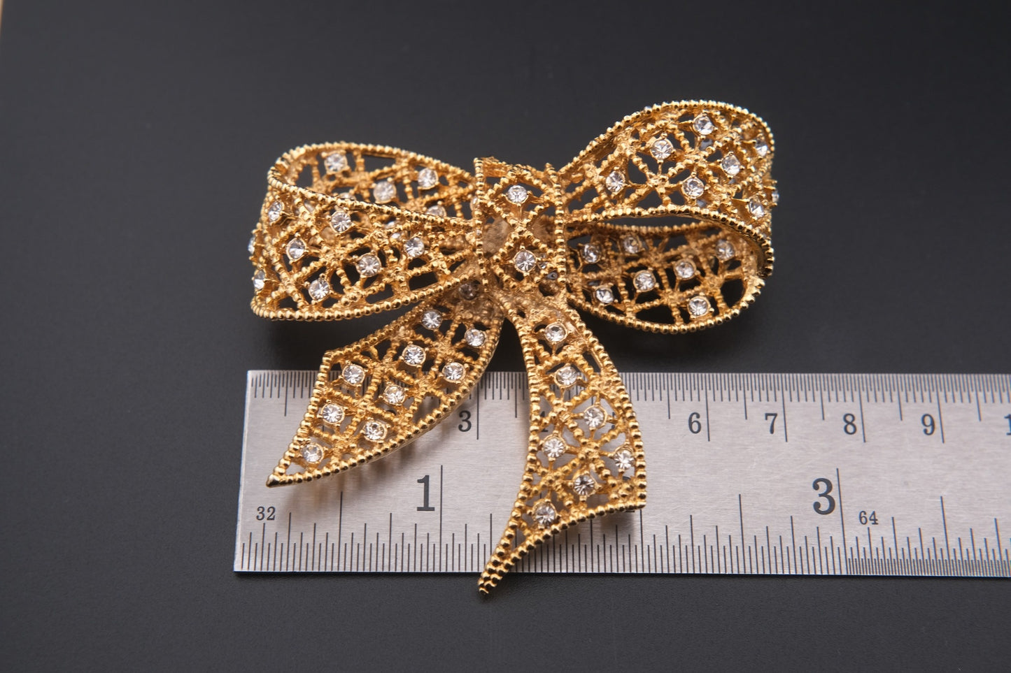 Vintage Kenneth Jay Lane Filigree Bow Brooch – Gold-Tone with Crystal Rhinestones