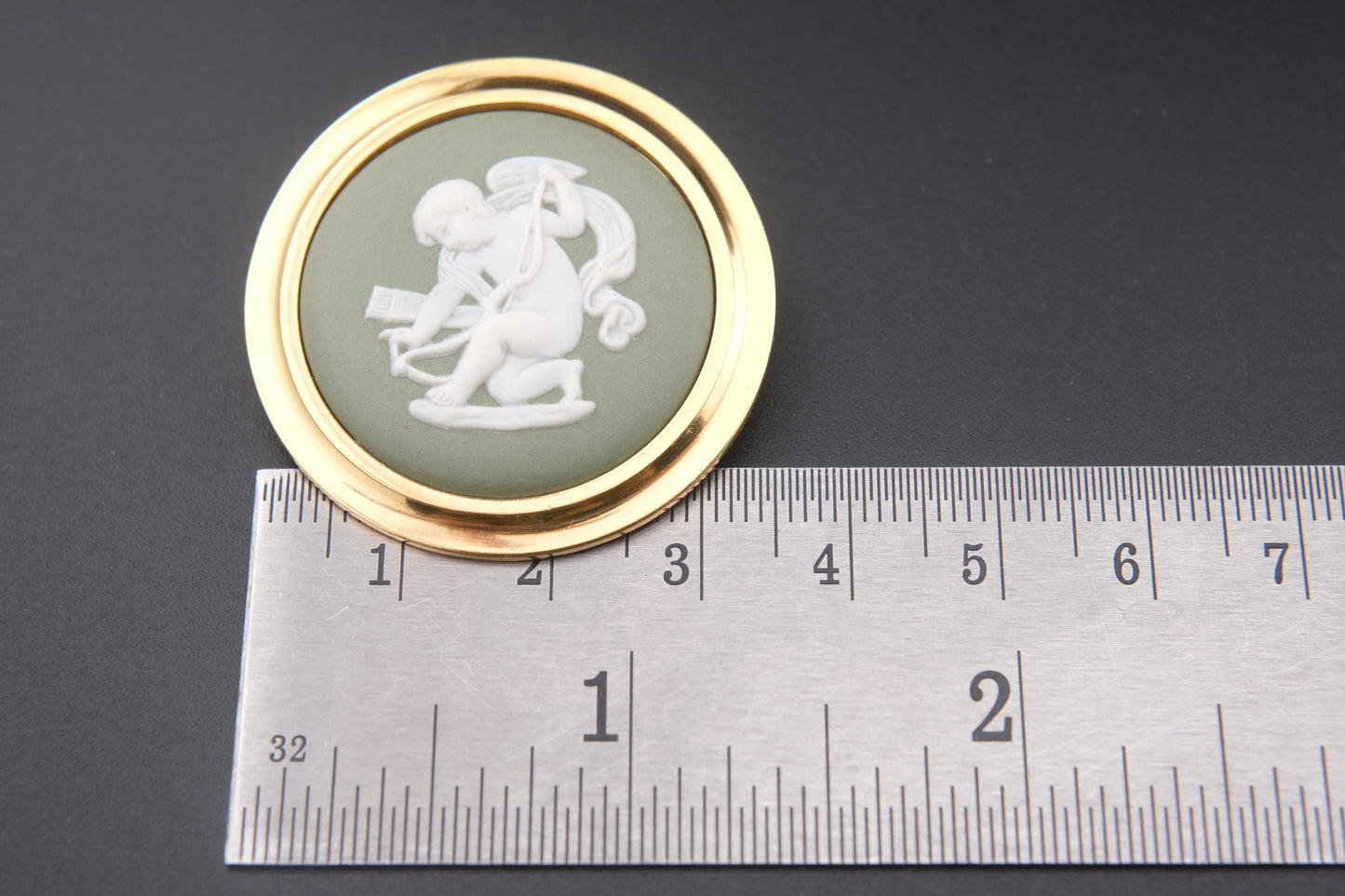 Vintage Wedgwood Jasperware Cameo Brooch – Green & White Cupid Motif with Gold-Tone Frame