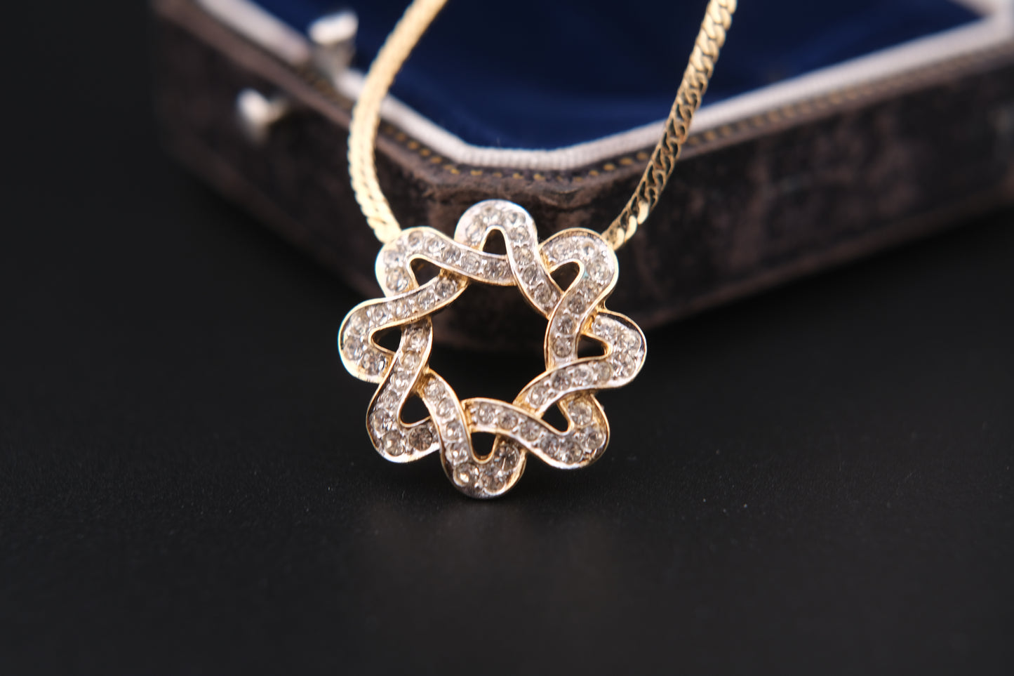 Nina Ricci Star Knot Crystal Necklace – Gold-Tone Choker Style