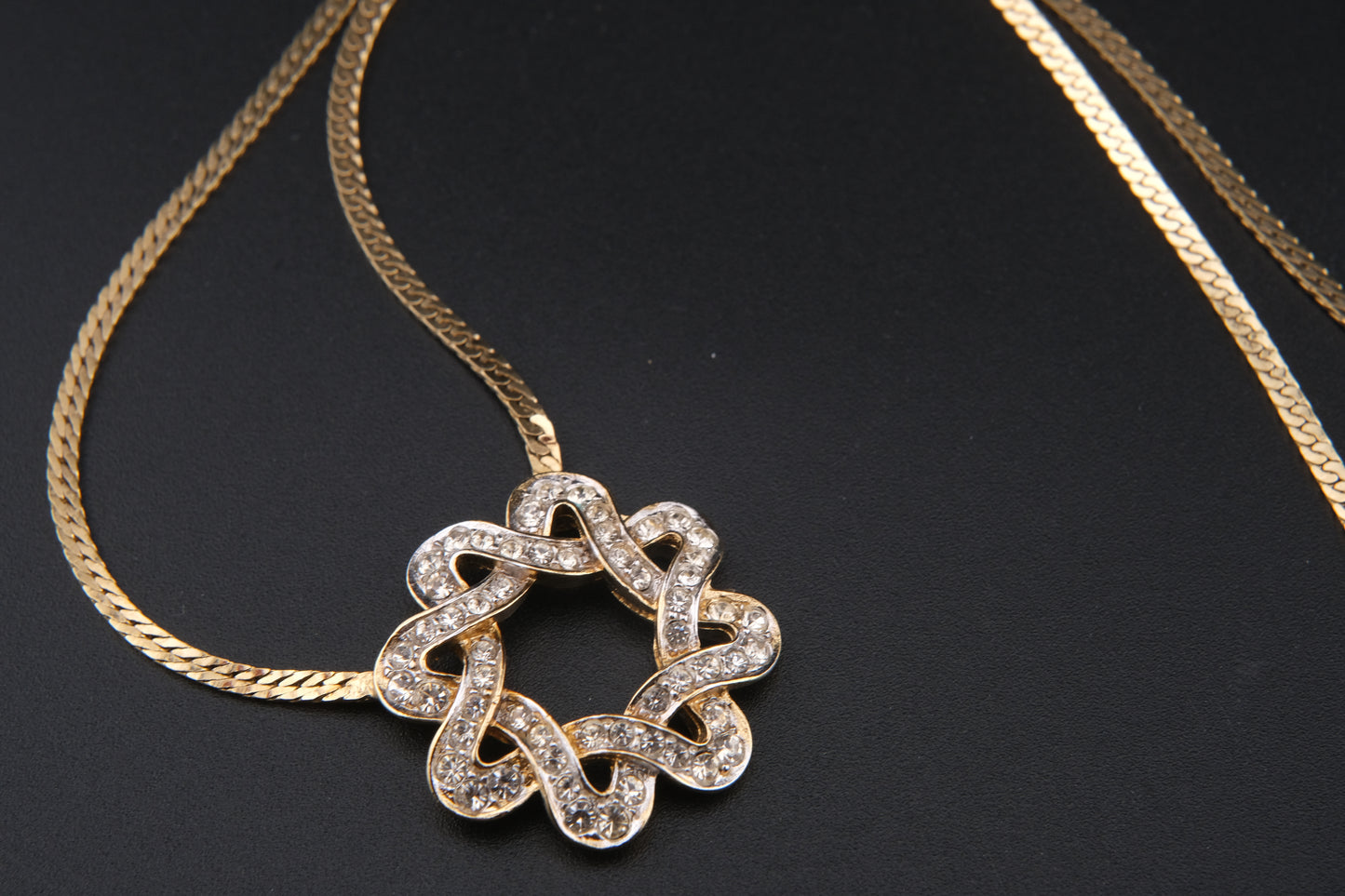 Nina Ricci Star Knot Crystal Necklace – Gold-Tone Choker Style