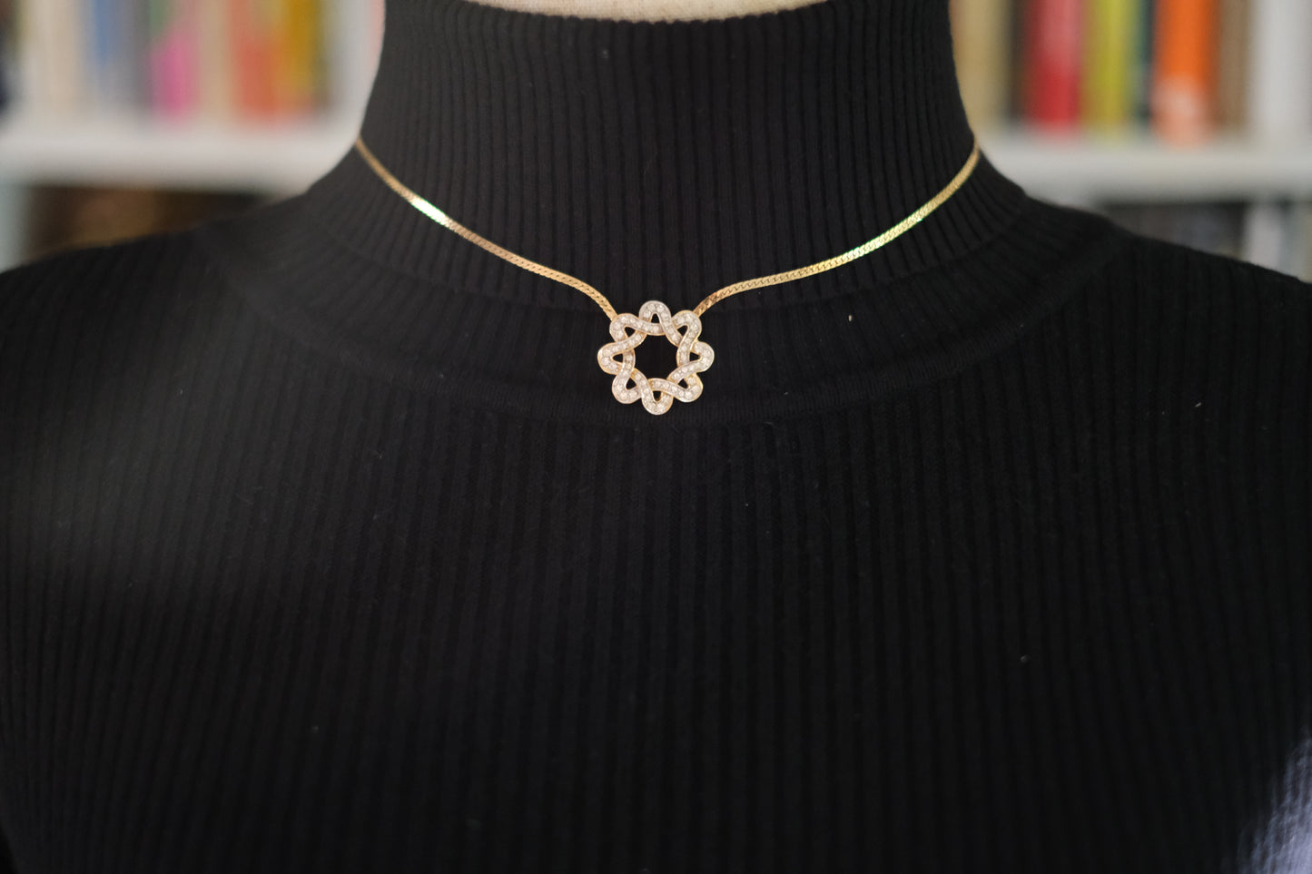 Nina Ricci Star Knot Crystal Necklace – Gold-Tone Choker Style