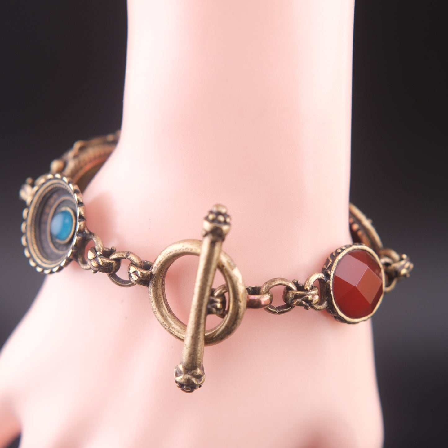 Vintage Multi-Charm Bracelet with Religious and Symbolic Motifs – Snake Locket