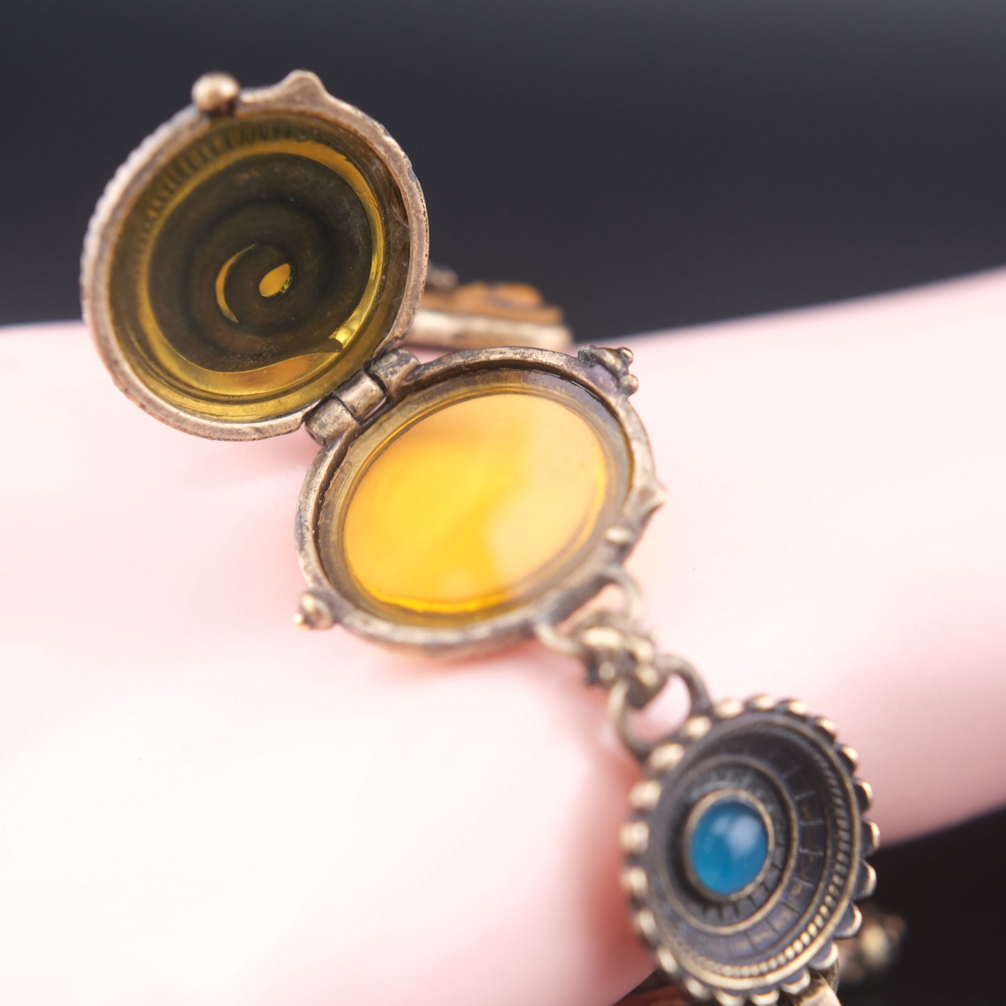 Vintage Multi-Charm Bracelet with Religious and Symbolic Motifs – Snake Locket