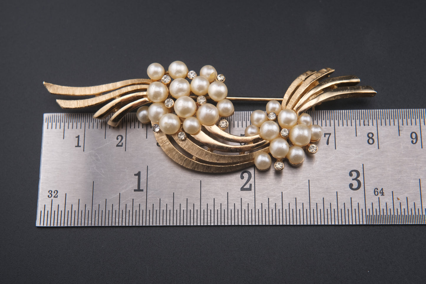 Vintage Crown Trifari Faux Pearl Brooch – Gold-Tone Swirl with Rhinestone Accents (1950s–60s)
