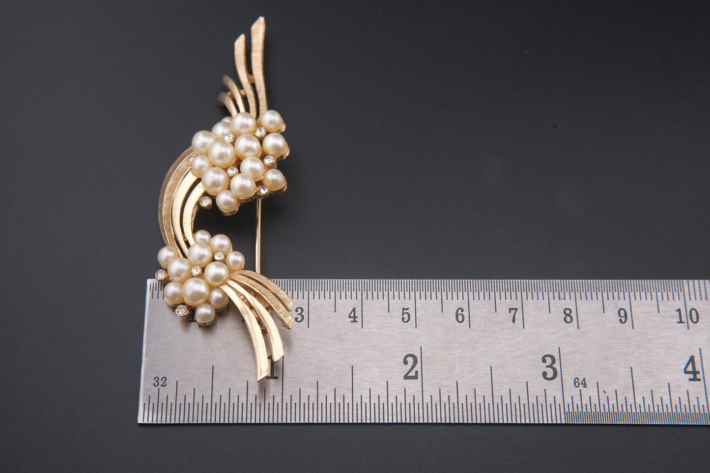 Vintage Crown Trifari Faux Pearl Brooch – Gold-Tone Swirl with Rhinestone Accents (1950s–60s)