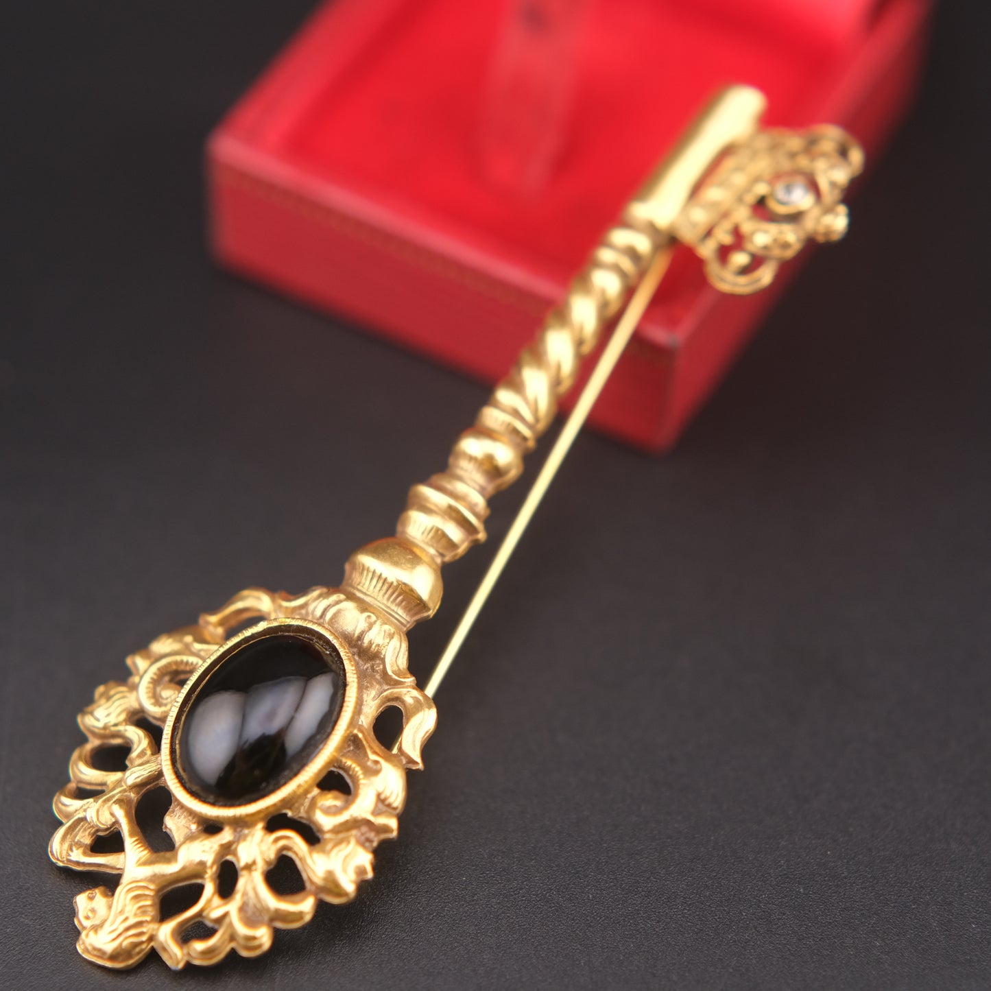 Vintage Gold-Tone Key Brooch with Black Cabochon and Crown Detail