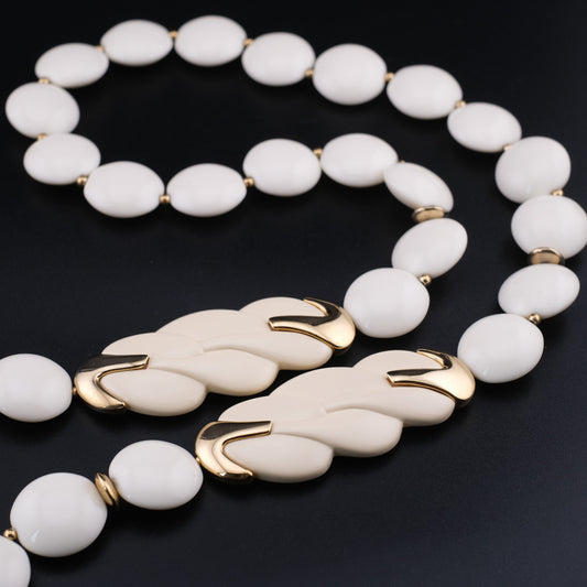 Vintage Trifari White Lucite Station Necklace with Sculptural Gold-Tone Accents