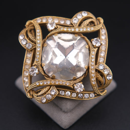 ❤️ Vintage Gold-Tone Rhinestone Brooch with Large Faceted Crystal Center, Sculptural Ribbon Design
