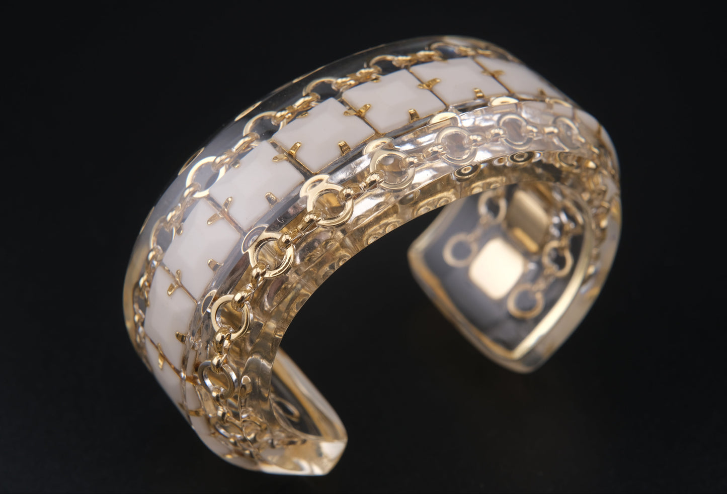 Clear Resin Cuff Bracelet with Gold-Tone Chain and White Inlay – Bold Sculptural Statement