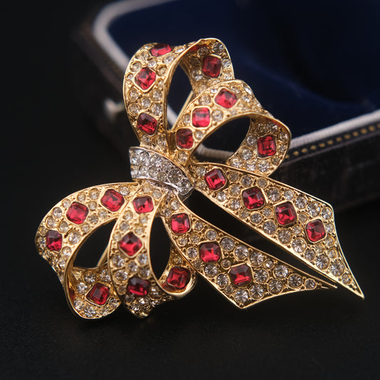 Nina Ricci Bow Brooch – Gold-Tone with Red and Clear Crystals