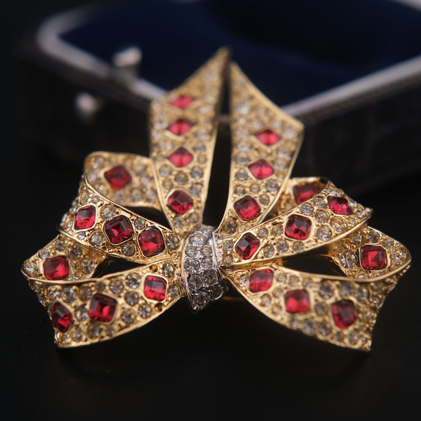 Nina Ricci Bow Brooch – Gold-Tone with Red and Clear Crystals