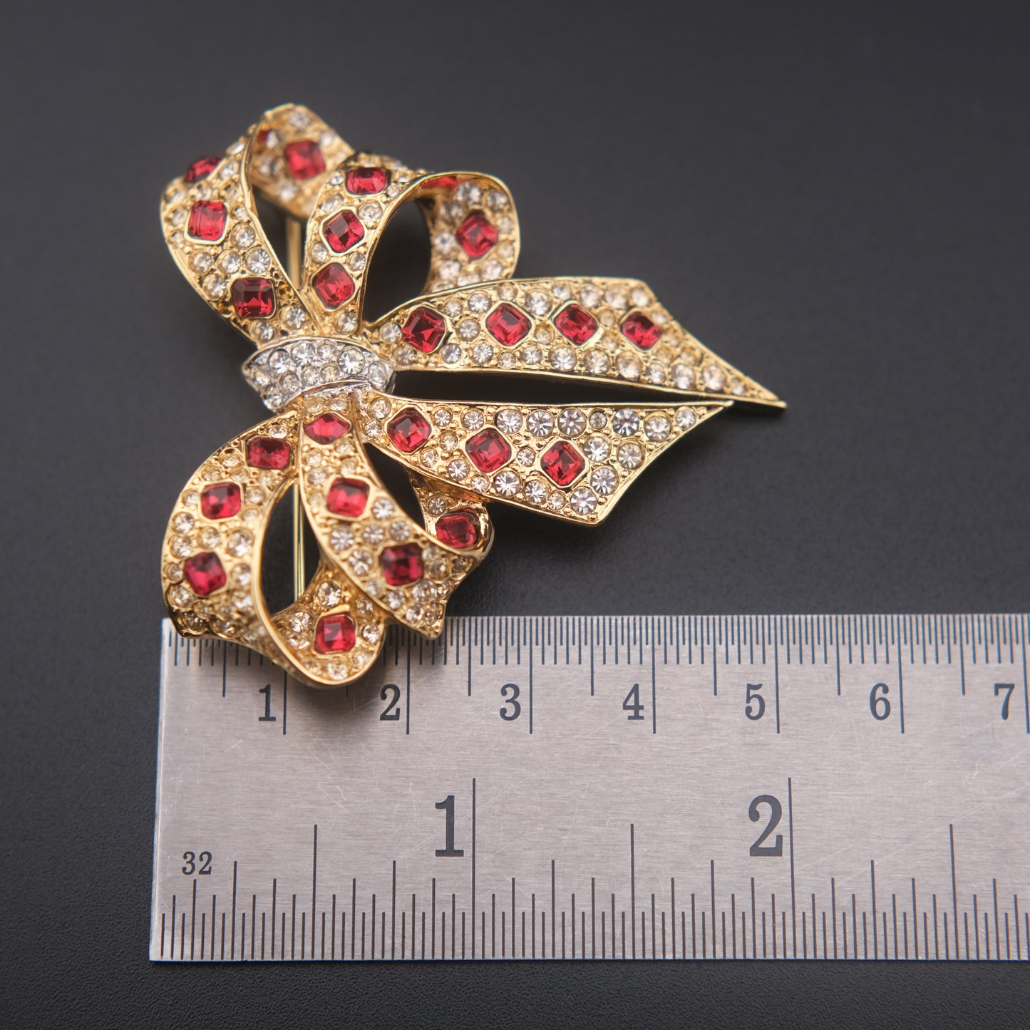 Nina Ricci Bow Brooch – Gold-Tone with Red and Clear Crystals