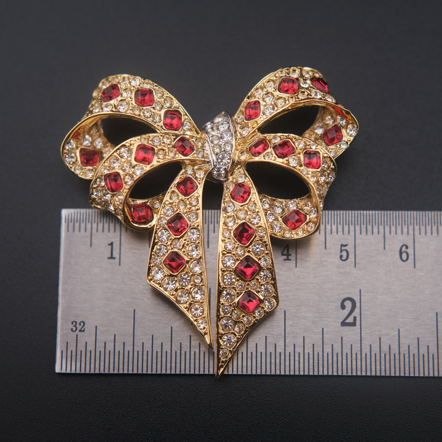Nina Ricci Bow Brooch – Gold-Tone with Red and Clear Crystals