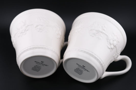 Wedgwood Festivity Raspberry Queen’s Ware Mug Pair – White Embossed Relief with Raspberry Interior Motif