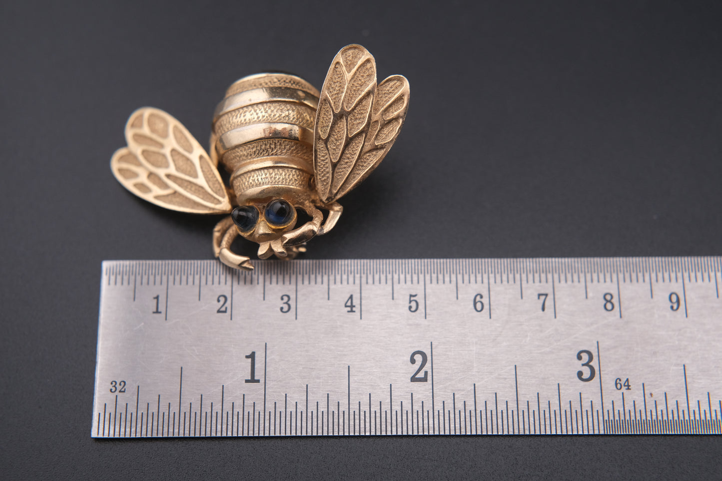 Vintage Wiggle-Wing Bee Brooch – Gold Tone Metal with Black Cabochon Eyes | 1950s–1960s Statement Pin
