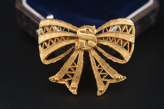 Vintage Sonia Rykiel Gold-Tone Filigree Bow Brooch with SR Monogram