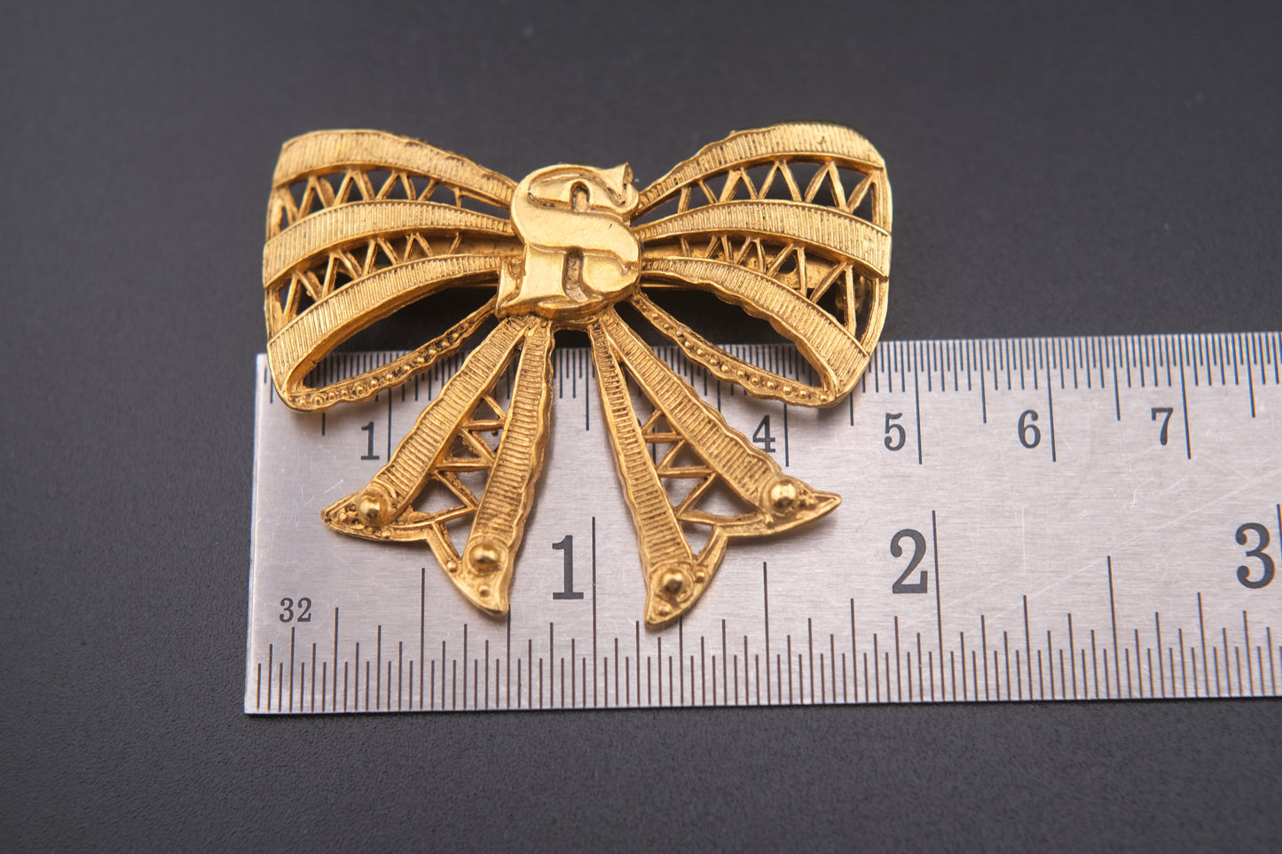 Vintage Sonia Rykiel Gold-Tone Filigree Bow Brooch with SR Monogram
