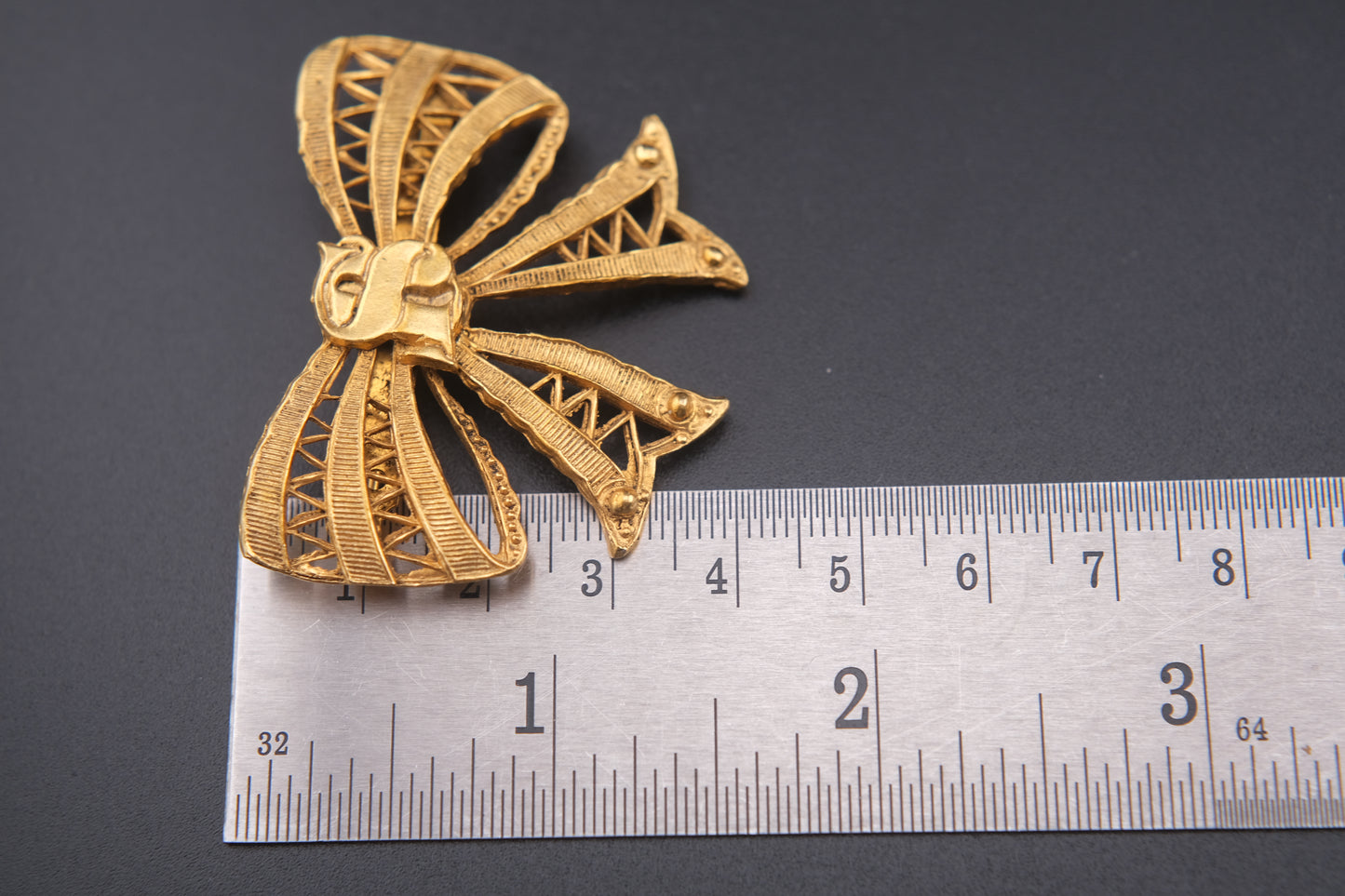 Vintage Sonia Rykiel Gold-Tone Filigree Bow Brooch with SR Monogram