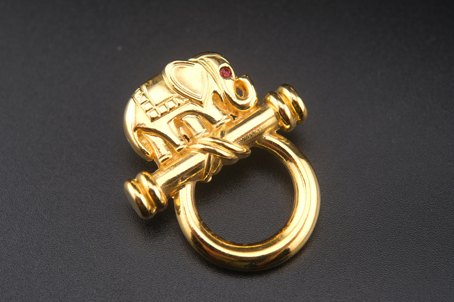 Vintage Malka Paris Elephant Pin – Gilded Gold-Tone with Red Crystal Eye, Made in France