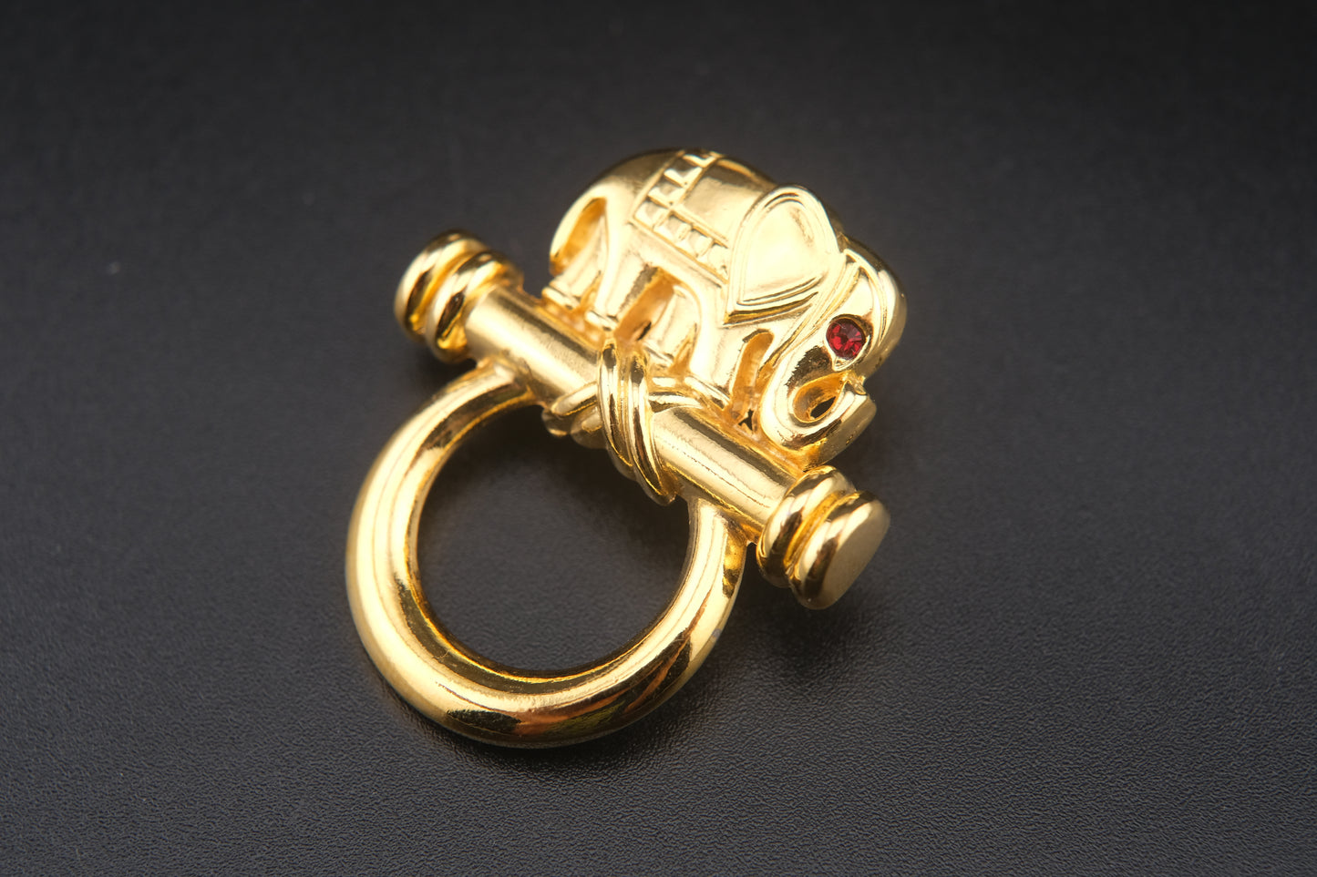 Vintage Malka Paris Elephant Pin – Gilded Gold-Tone with Red Crystal Eye, Made in France