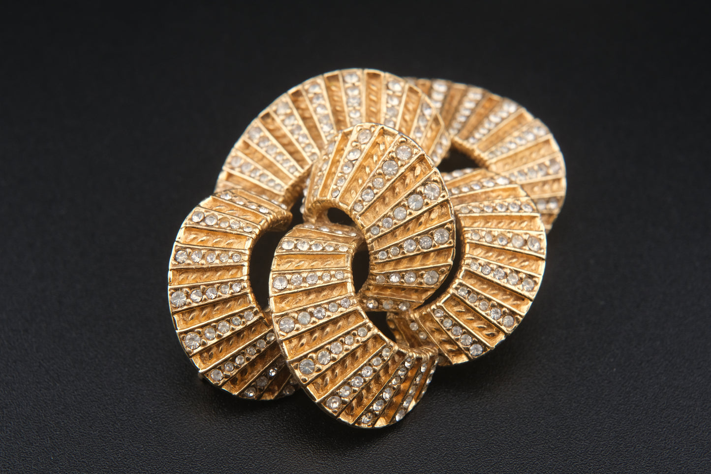 Vintage Ciner Brooch – Gold-Tone Interlocking Loops with Clear Rhinestones