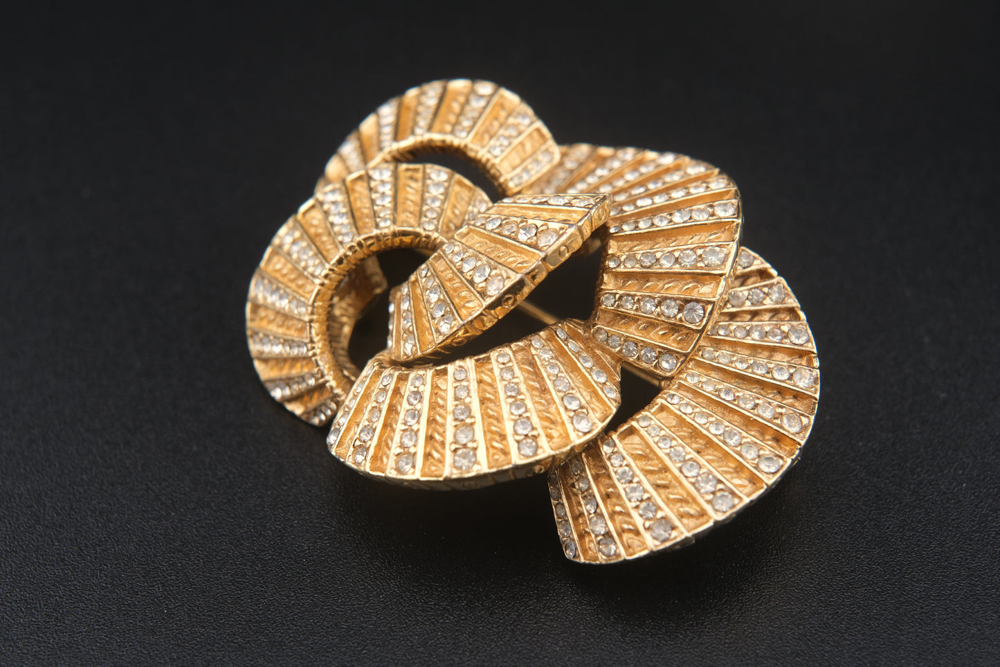 Vintage Ciner Brooch – Gold-Tone Interlocking Loops with Clear Rhinestones
