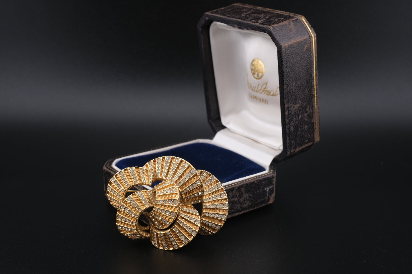 Vintage Ciner Brooch – Gold-Tone Interlocking Loops with Clear Rhinestones