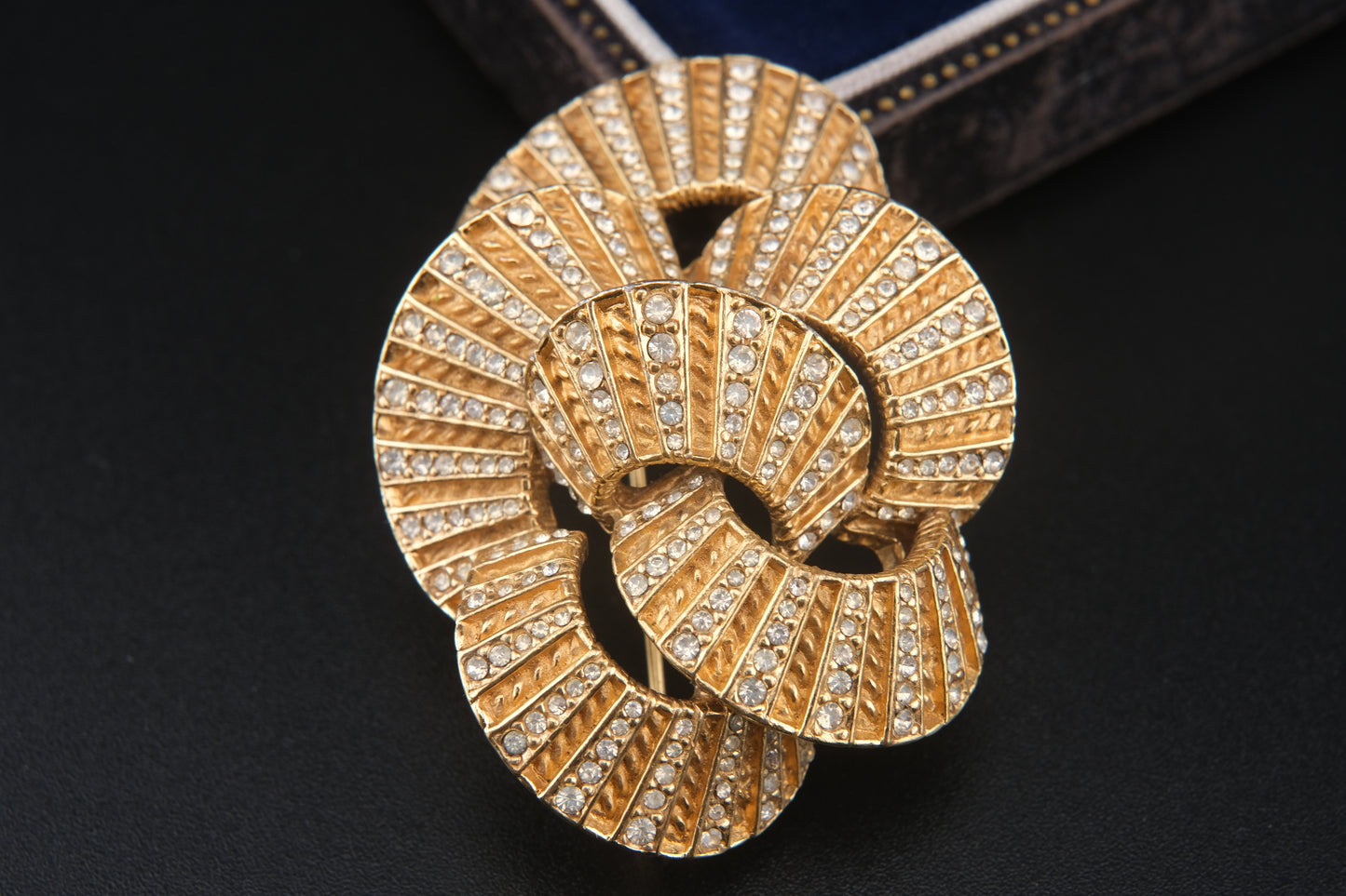 Vintage Ciner Brooch – Gold-Tone Interlocking Loops with Clear Rhinestones