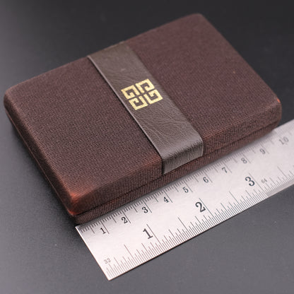 Vintage Givenchy 7000 Butane Lighter – Beige Enamel & Gold-Tone Trim with Signature Case