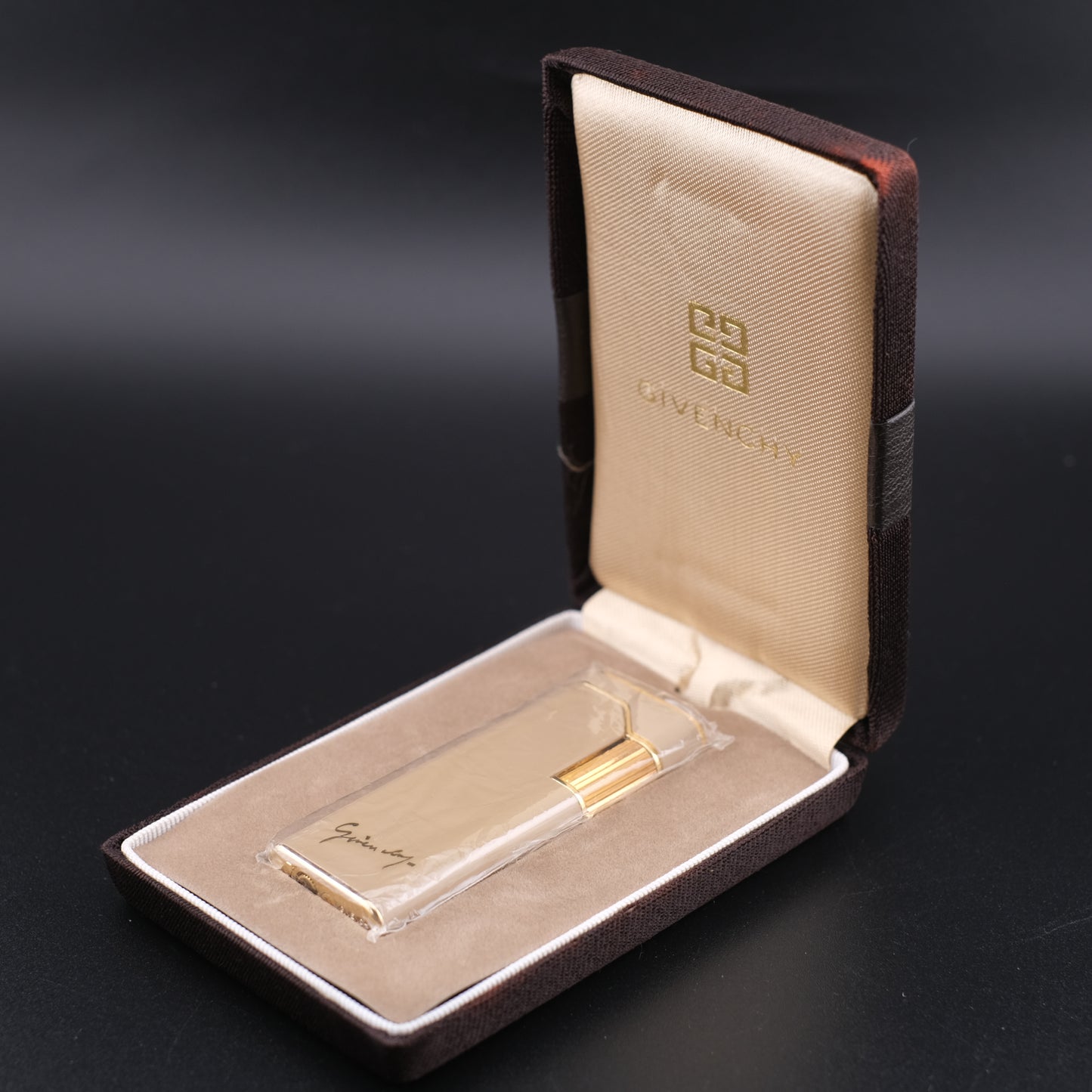 Vintage Givenchy 7000 Butane Lighter – Beige Enamel & Gold-Tone Trim with Signature Case