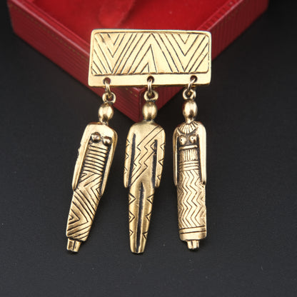 Vintage Signed Laurel Burch Tribal People Dangle Brooch – Gold Tone Bar Pin with Three Figures