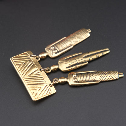 Vintage Signed Laurel Burch Tribal People Dangle Brooch – Gold Tone Bar Pin with Three Figures