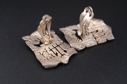 Vintage Sterling Silver Clip-On Earrings by Woods | Tribal Petroglyph Cut-Out Design | Hand-Hammered Texture
