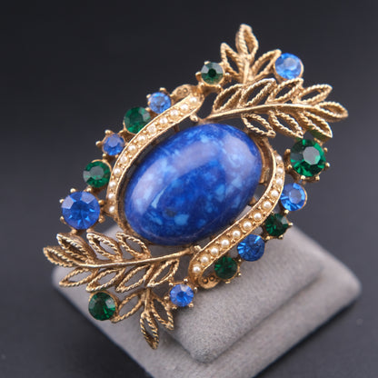 ❤️ Vintage Abstract Blue Cabochon Brooch – Gold Tone with Rhinestones & Faux Pearl Accent