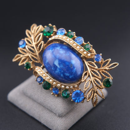 ❤️ Vintage Abstract Blue Cabochon Brooch – Gold Tone with Rhinestones & Faux Pearl Accent