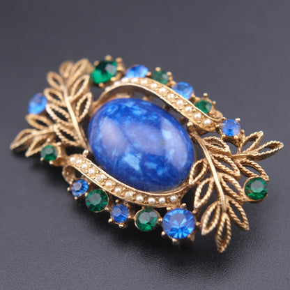 ❤️ Vintage Abstract Blue Cabochon Brooch – Gold Tone with Rhinestones & Faux Pearl Accent
