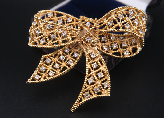 Vintage Kenneth Jay Lane Filigree Bow Brooch – Gold-Tone with Crystal Rhinestones