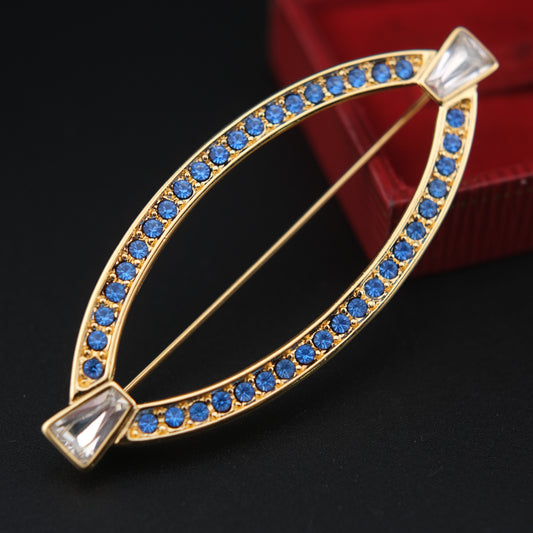 ❤️ Vintage Monet Gold Tone Blue Rhinestone Navette Brooch