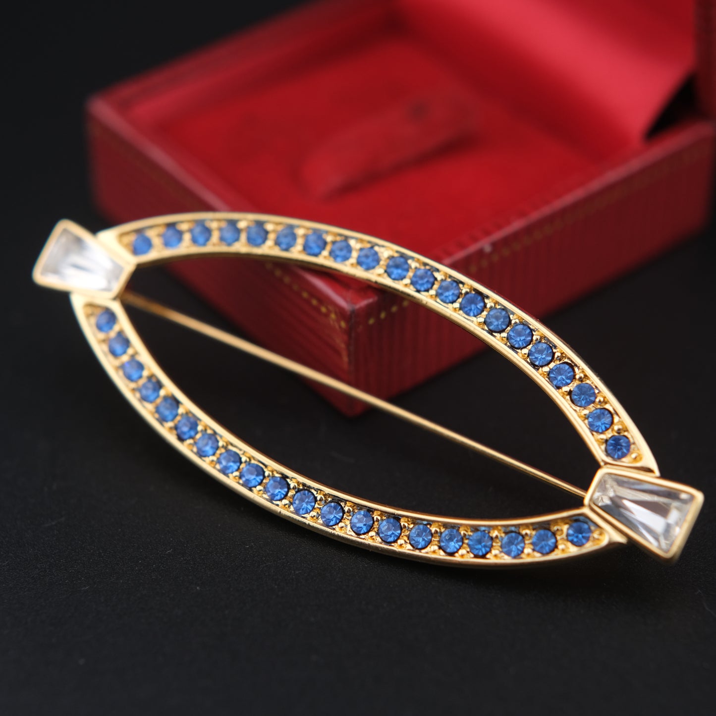 ❤️ Vintage Monet Gold Tone Blue Rhinestone Navette Brooch