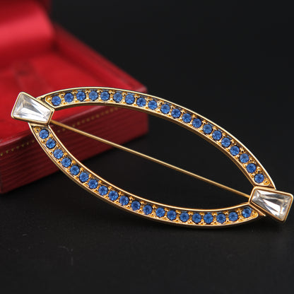 ❤️ Vintage Monet Gold Tone Blue Rhinestone Navette Brooch