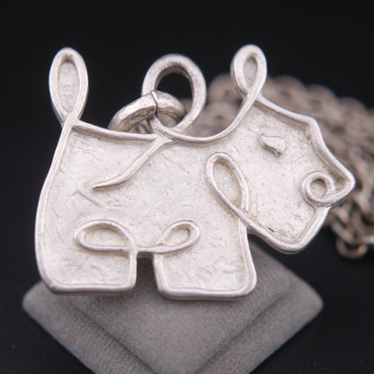 ❤️ Agatha Silver-Tone Dog Pendant Necklace – Textured Sculptural Design