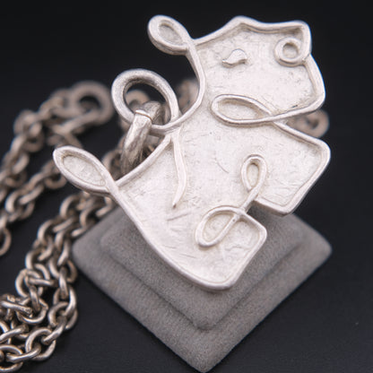 ❤️ Agatha Silver-Tone Dog Pendant Necklace – Textured Sculptural Design
