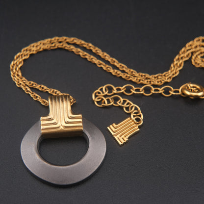 Vintage Lanvin Modernist Pendant Necklace, Gold & Matte Gunmetal Circle, 1980s Designer Jewelry