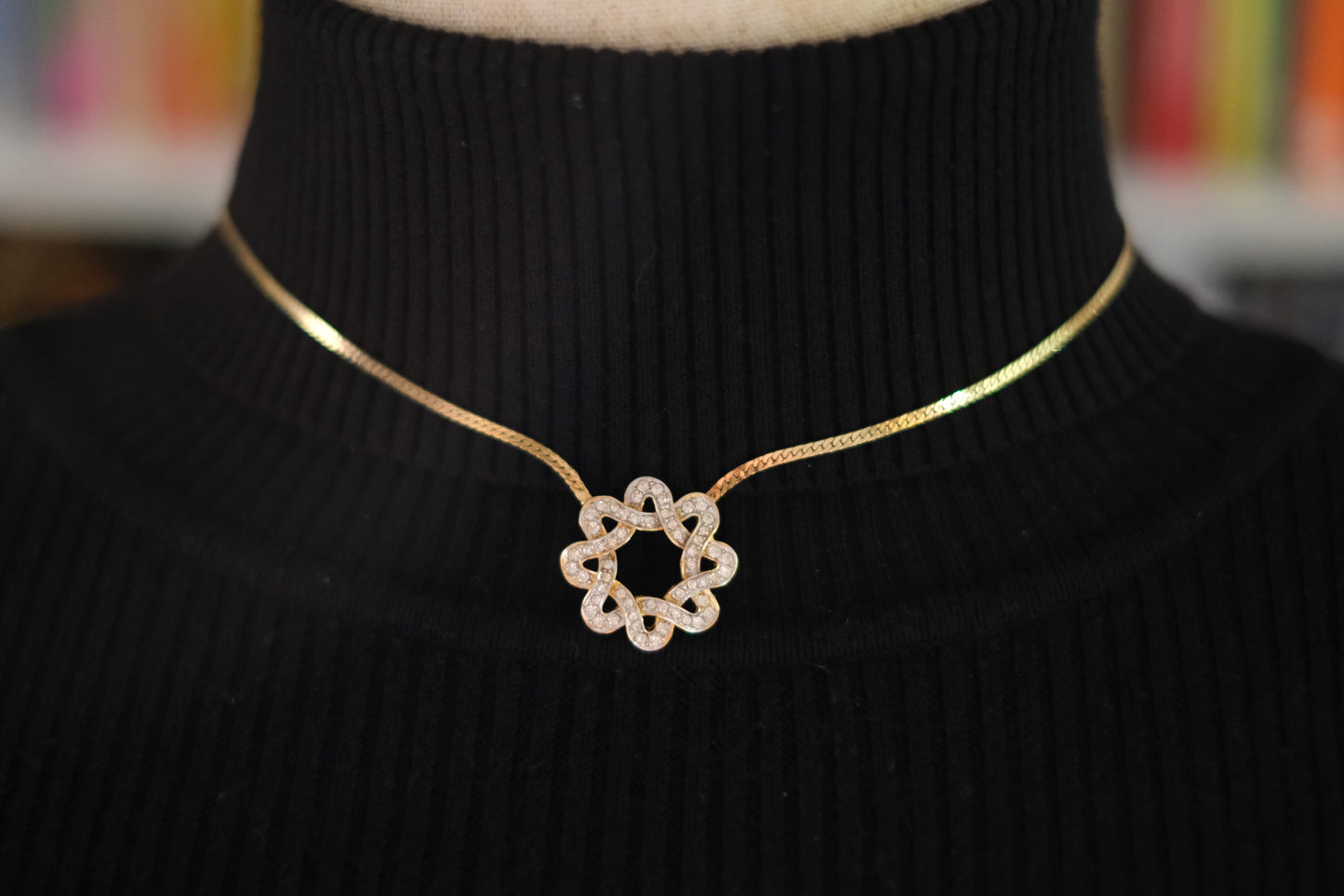 Nina Ricci Star Knot Crystal Necklace – Gold-Tone Choker Style